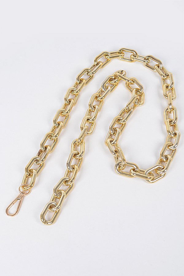 Oversized gold chain belt