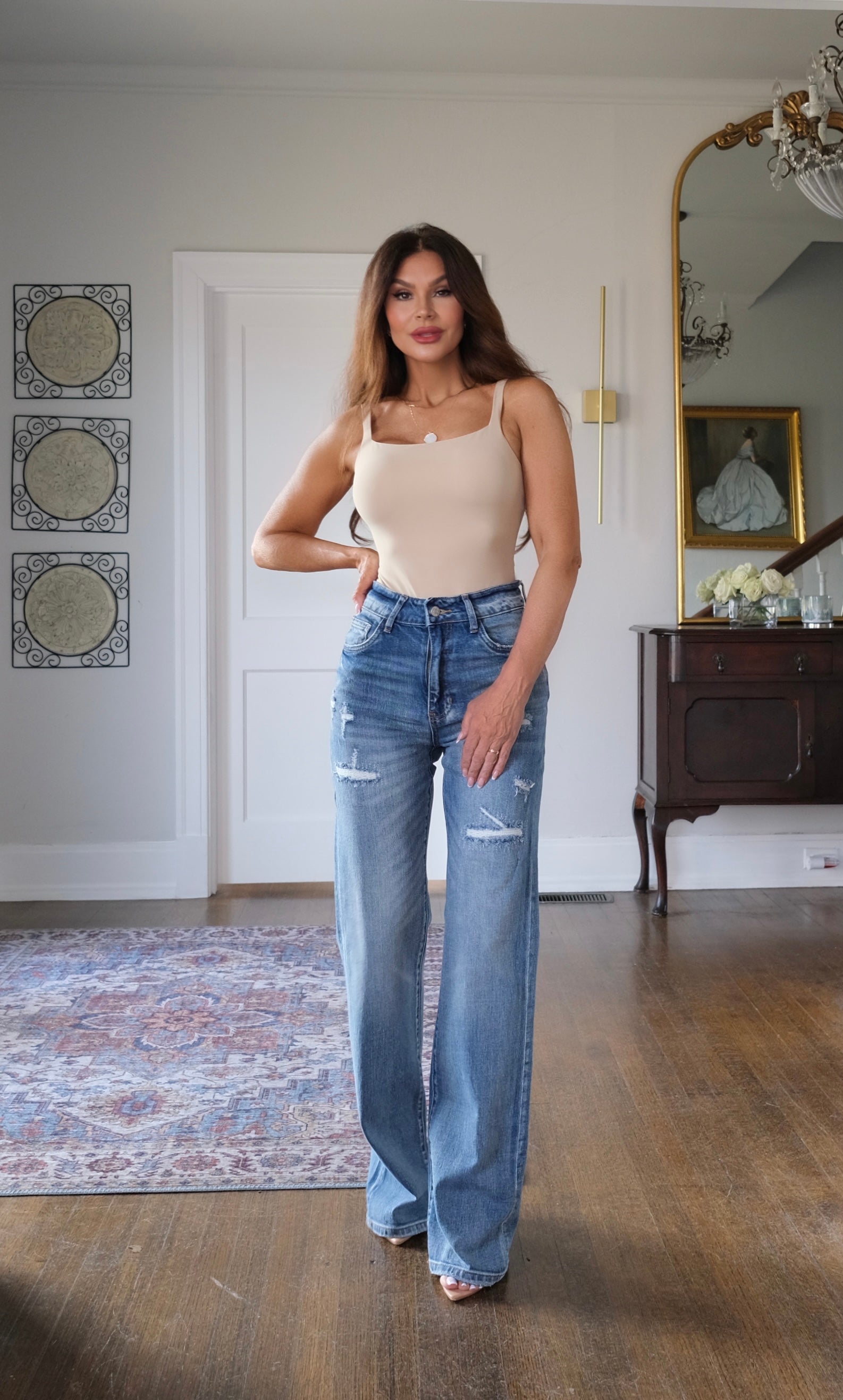 Ivory destructed medium wash straight leg jean