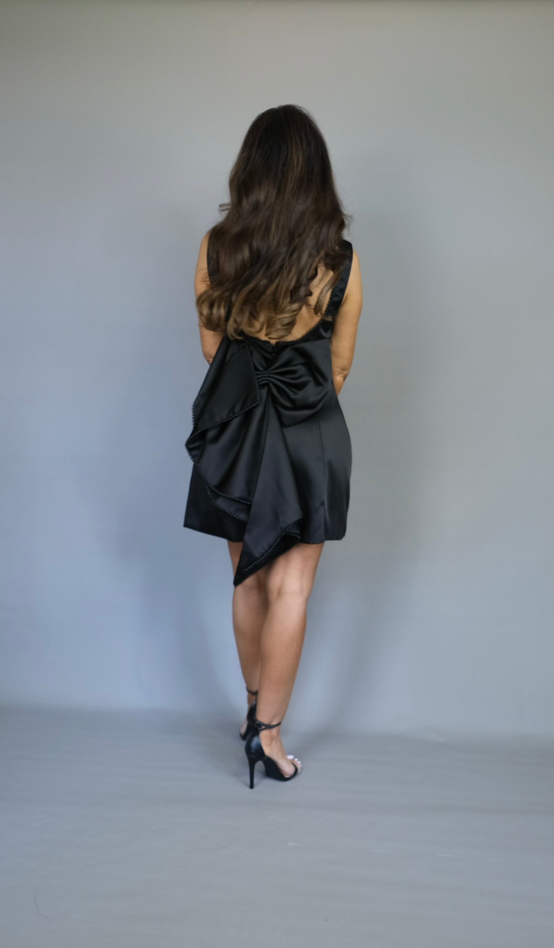 Josie black boat neck pearl trimmed bow mini dress