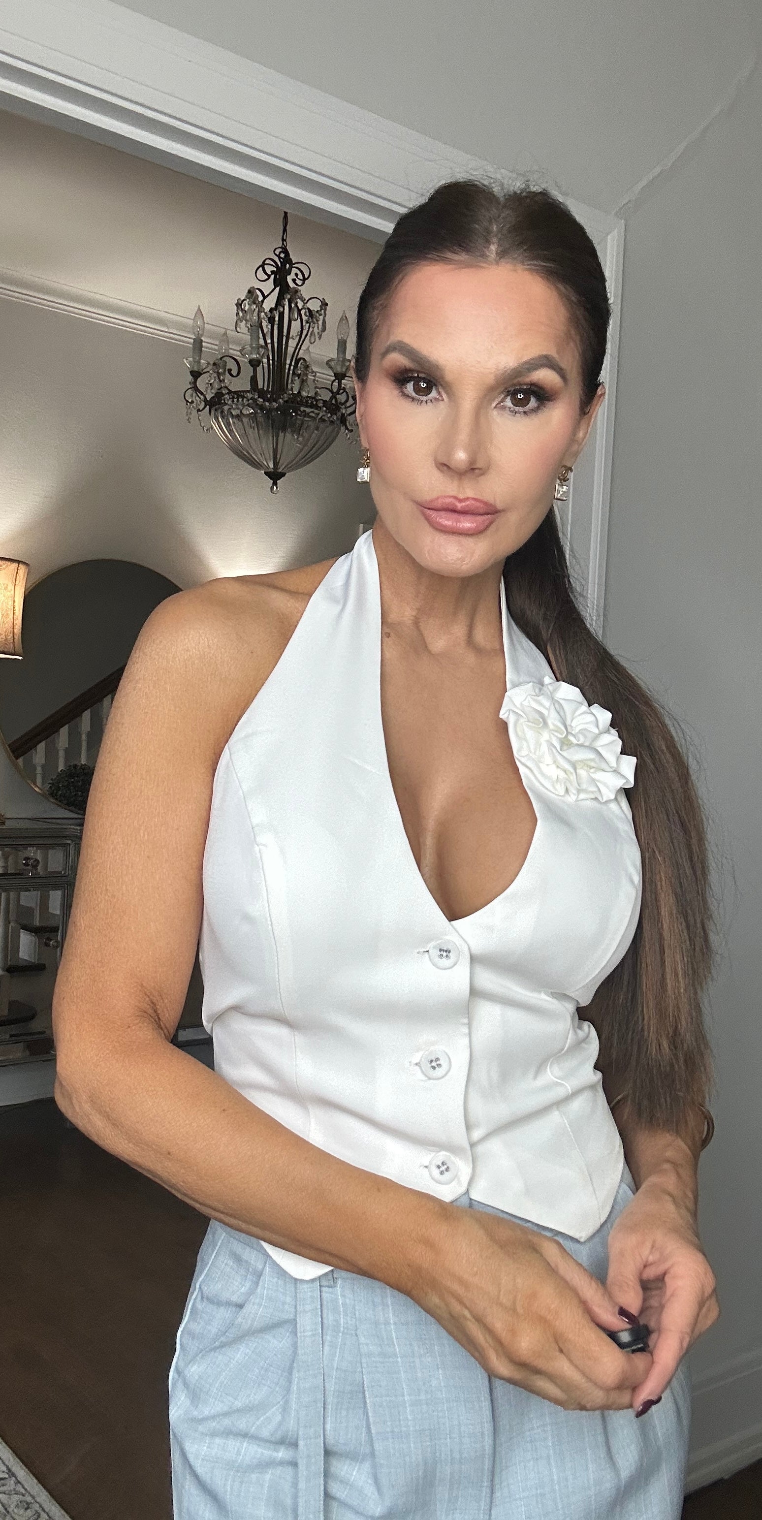 Kassidy white halter vest with rossette detail