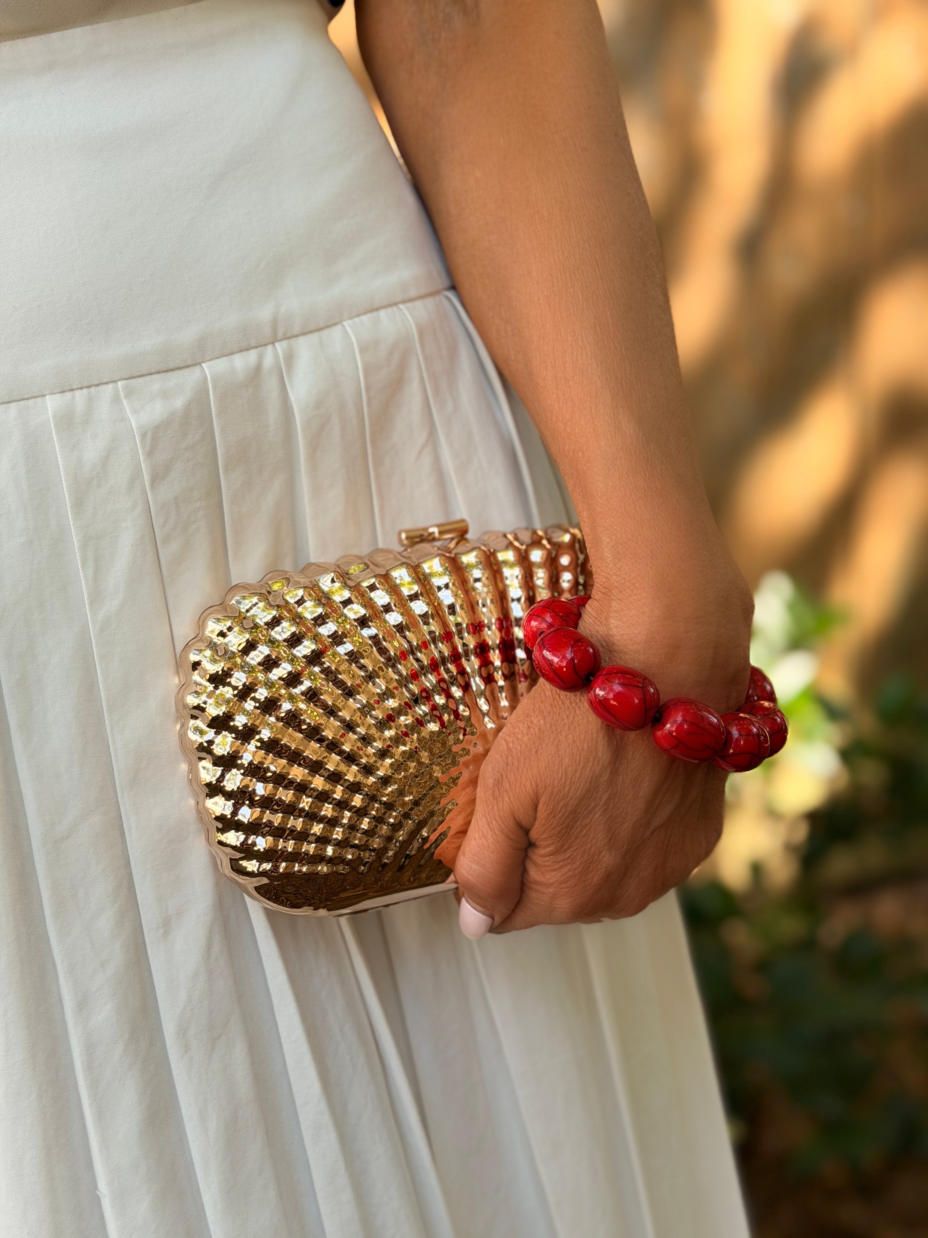 Gold seashell clutch