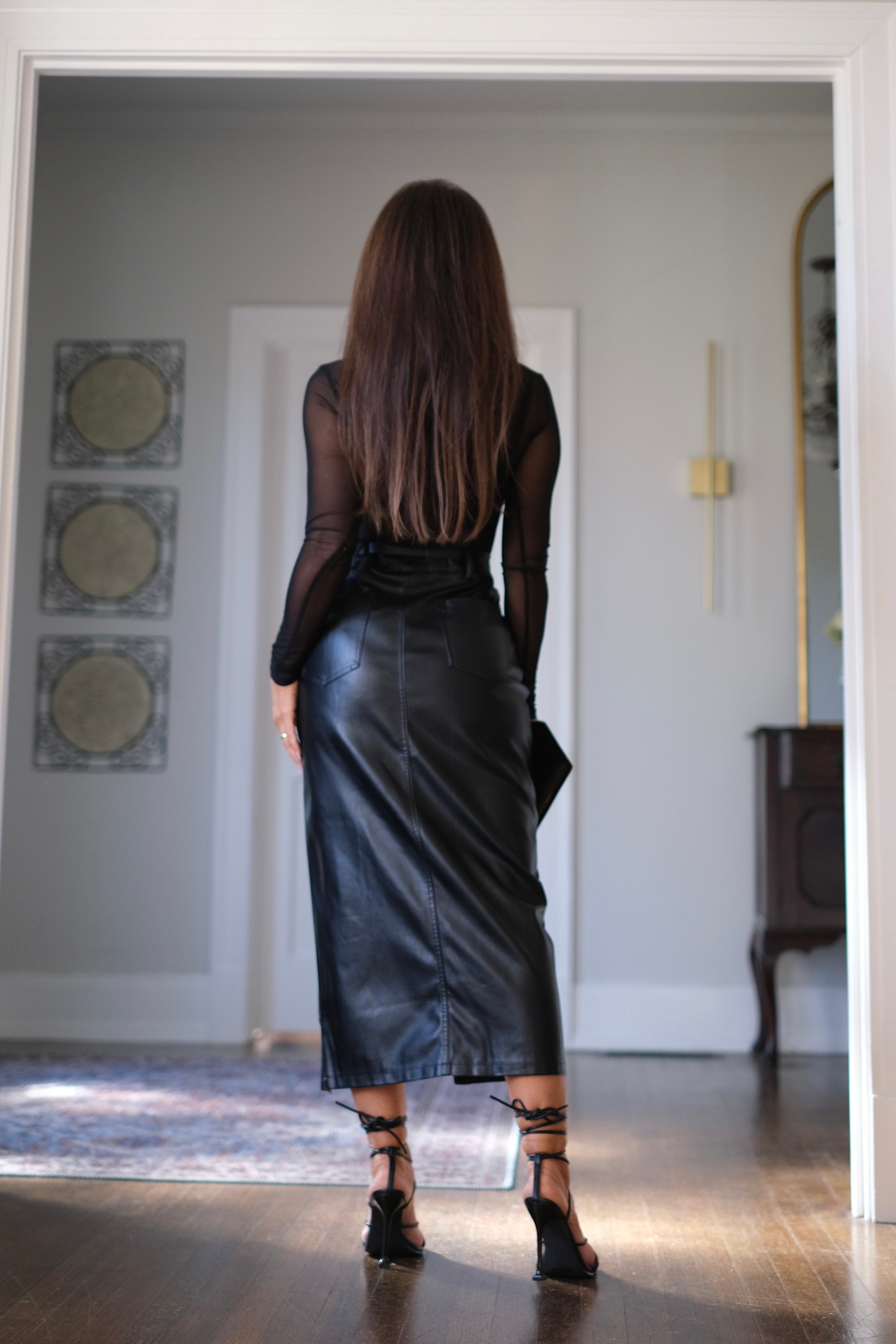 Carine black faux leather midi skirt with slit