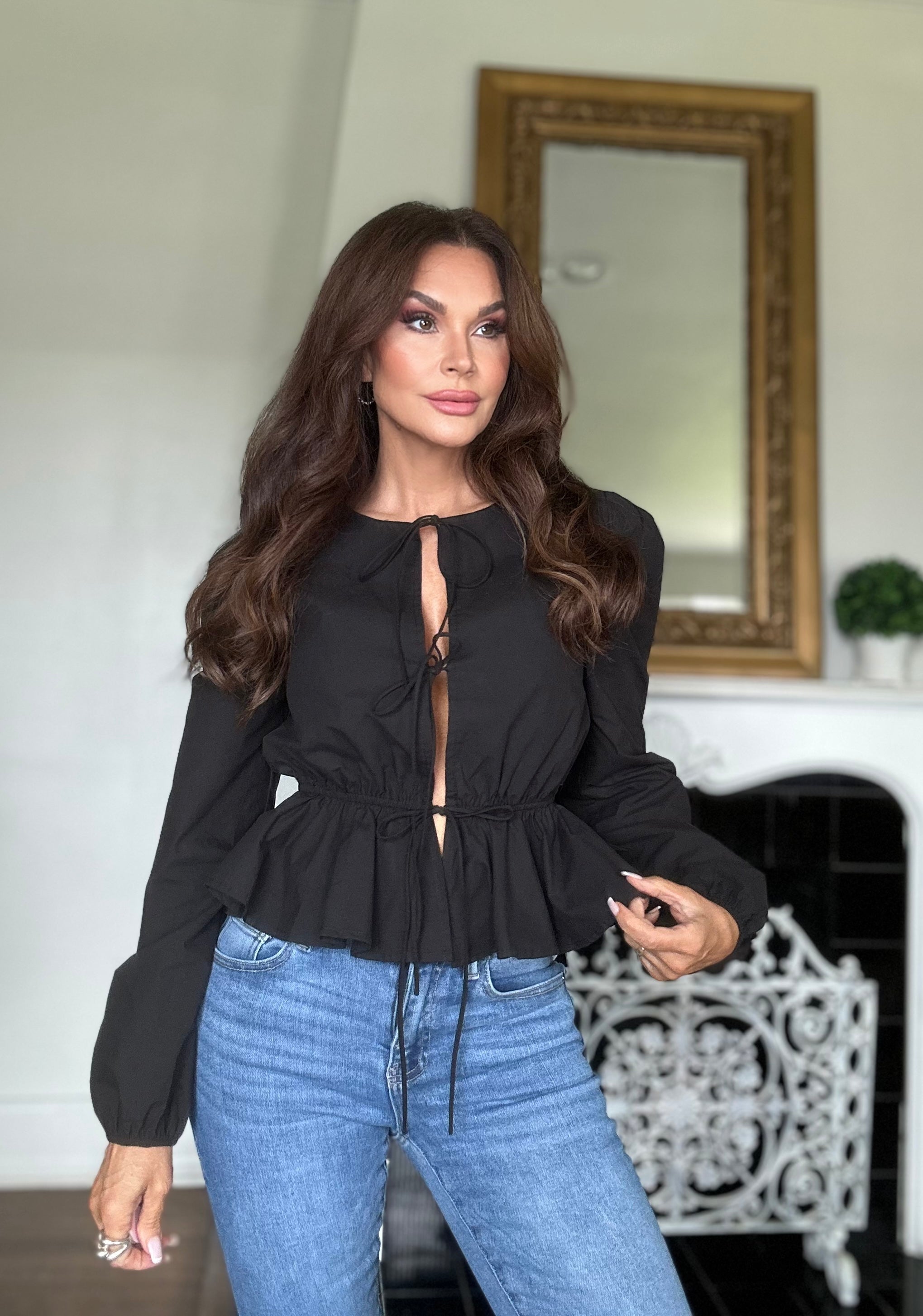 Ava black long sleeve peplum lace up top