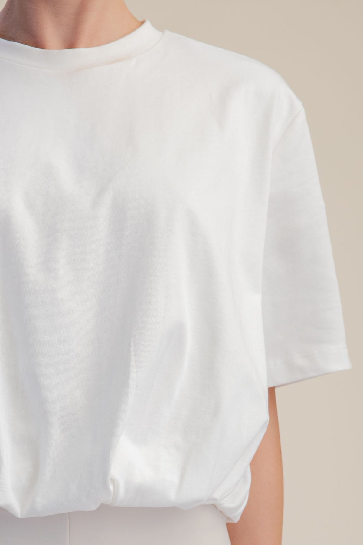 Evelyn White Cropped Bubble Hem Top