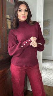 Roxy wine high necked sweater with pearl button detail