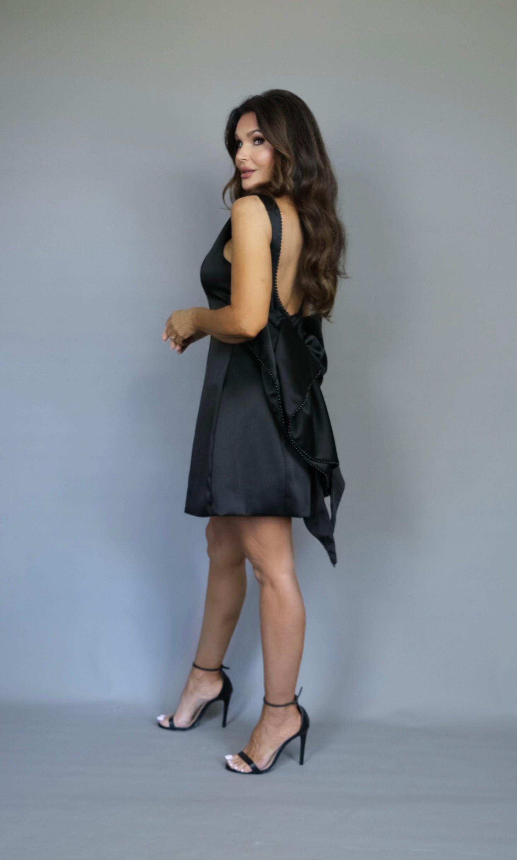 Josie black boat neck pearl trimmed bow mini dress