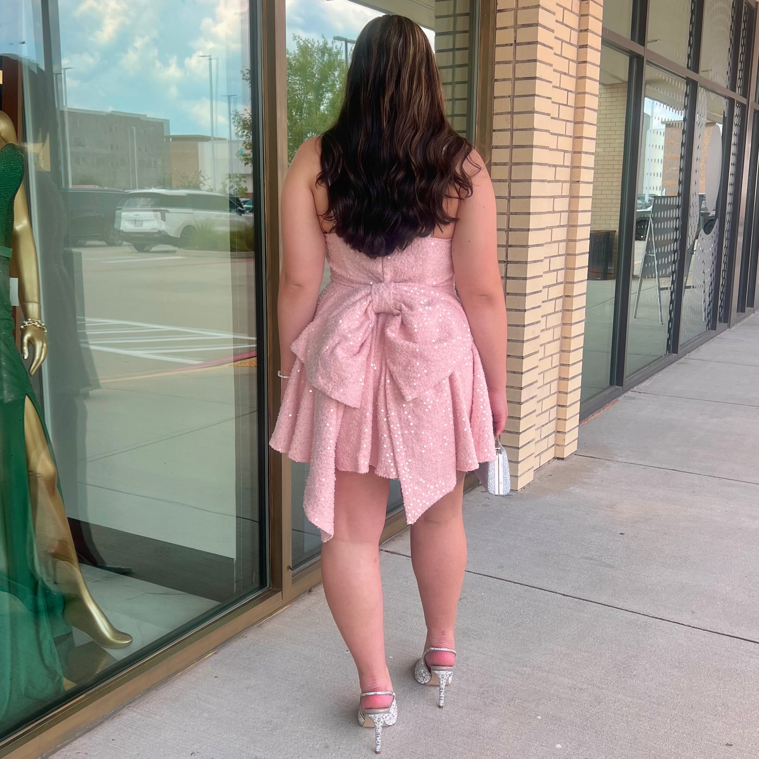 Poe pink sparkly bow back flare mini dress