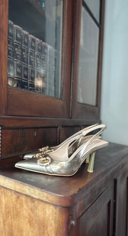 Nefertiti gold embellished T strap heeled sandal