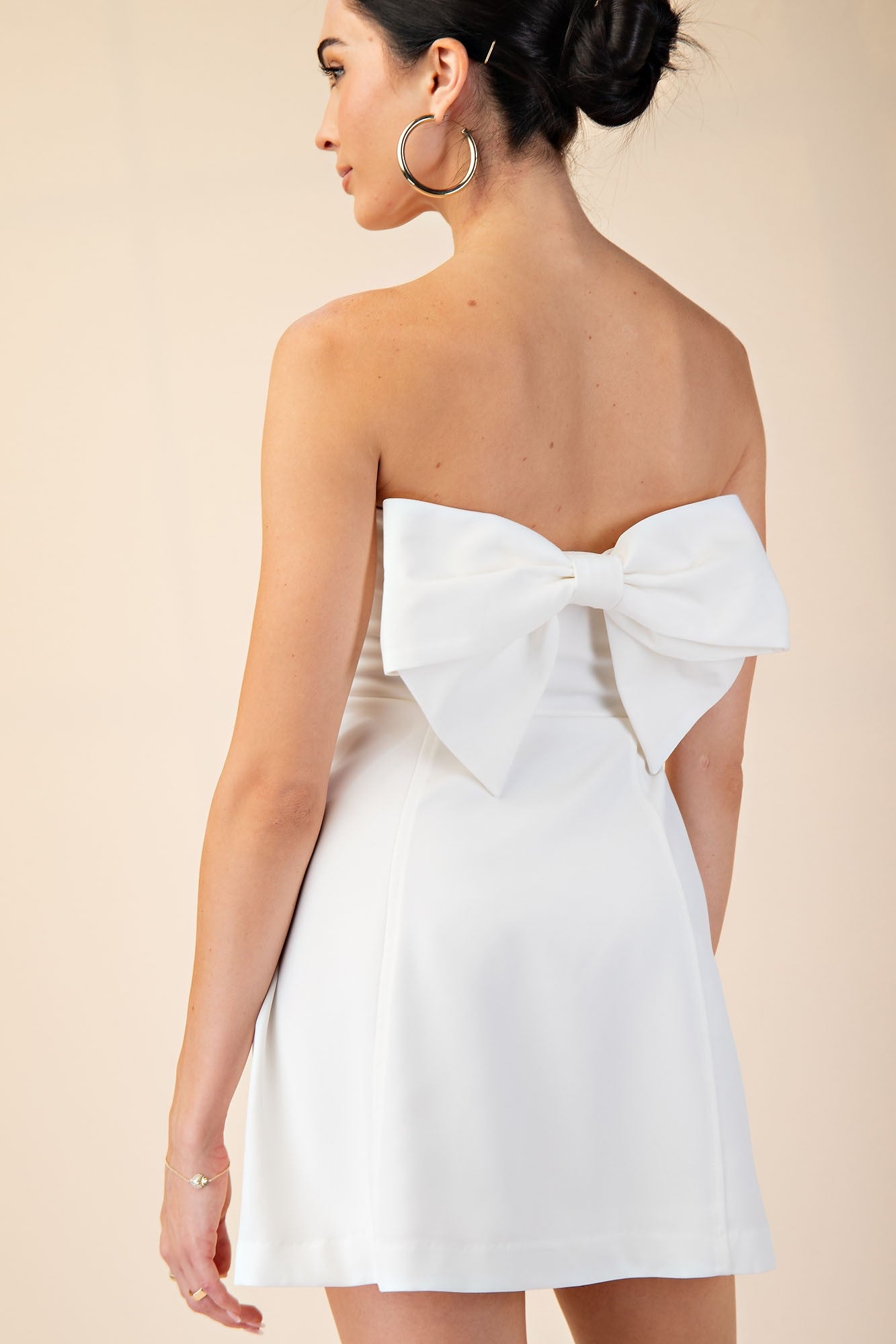 Sinead white strapless bow mini dress