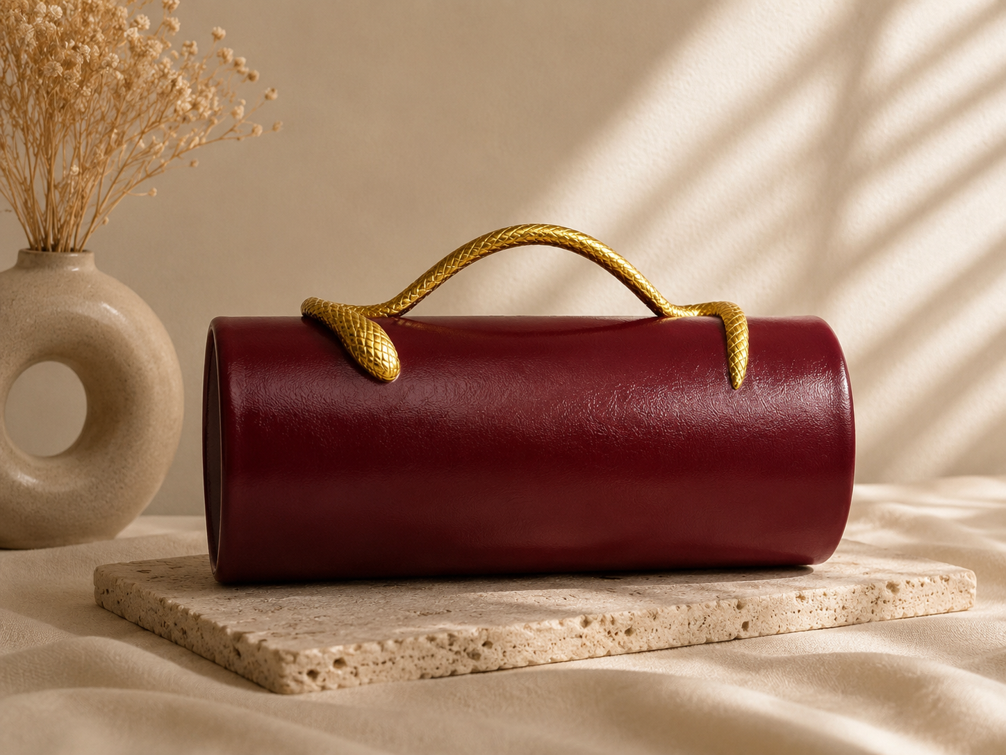 Cleo Burgundy Hard Case Clutch With Gold Snake Accent