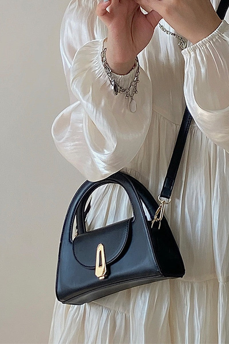 Tiny black half moon purse
