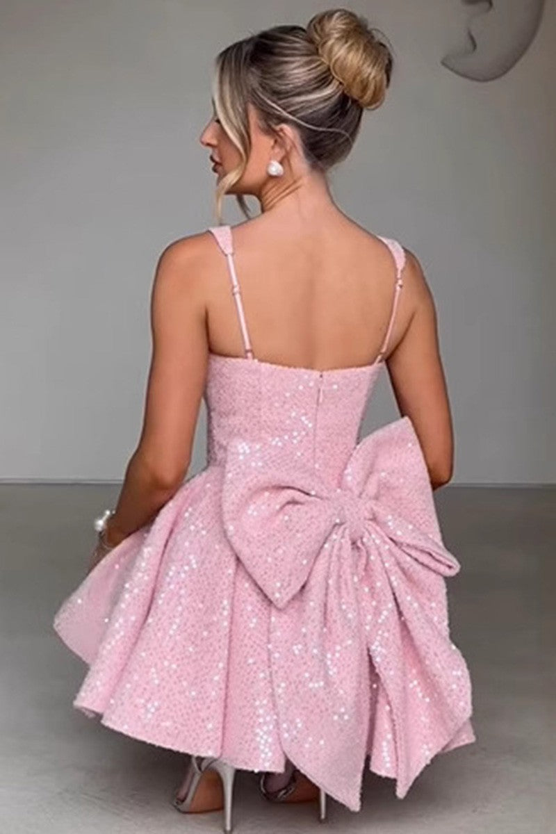 Poe pink sparkly bow back flare mini dress