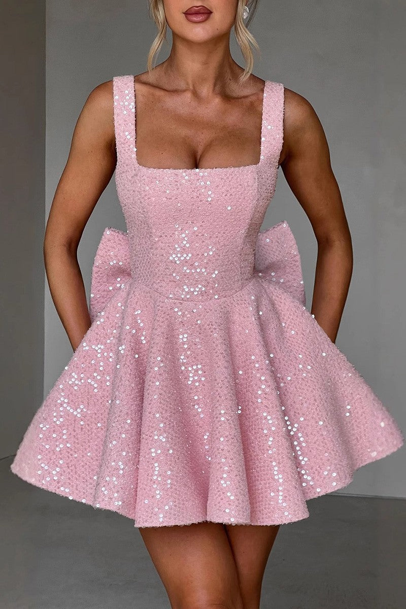 Poe pink sparkly bow back flare mini dress