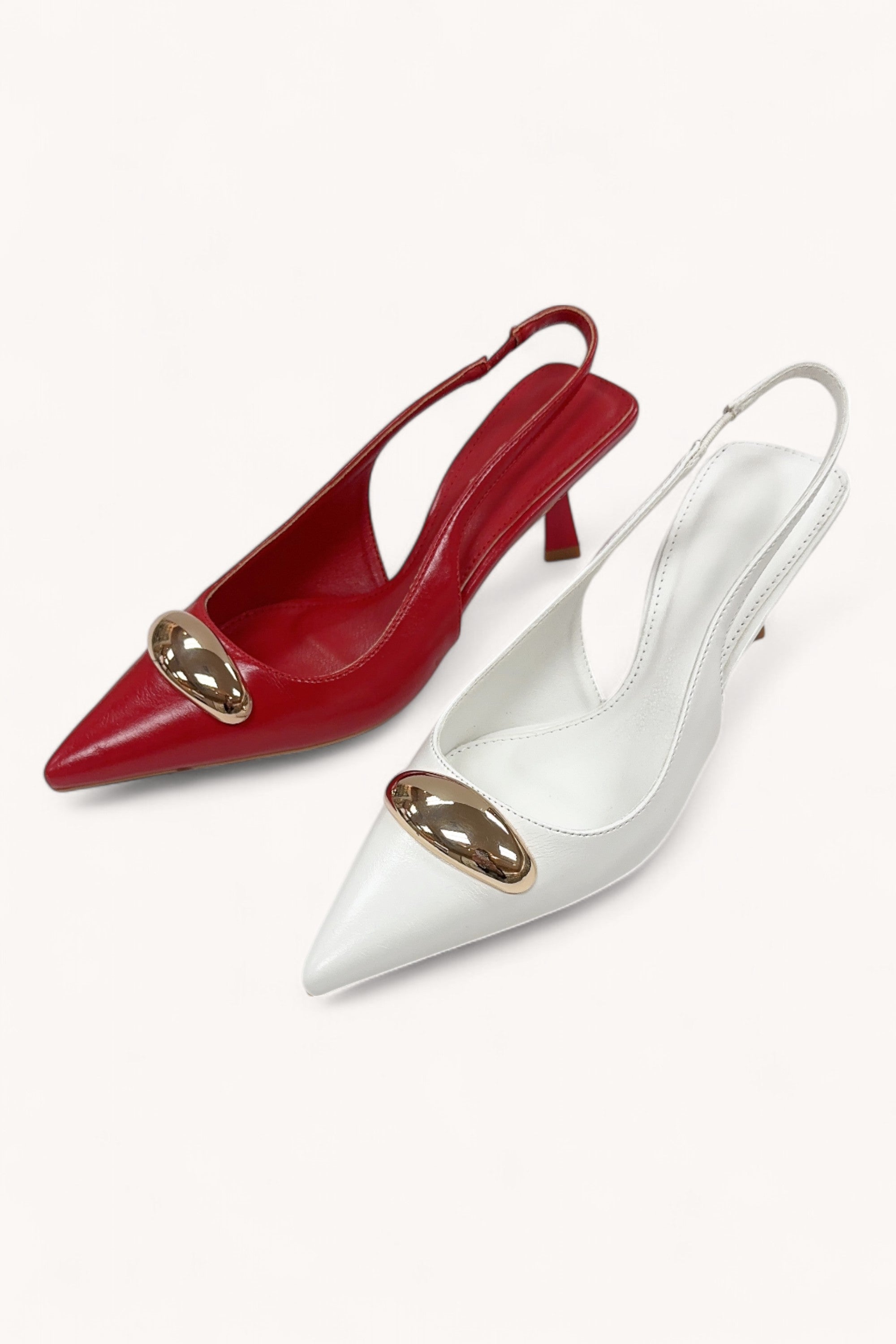 Penelope white  pointed-toe slingback with gold hardware
